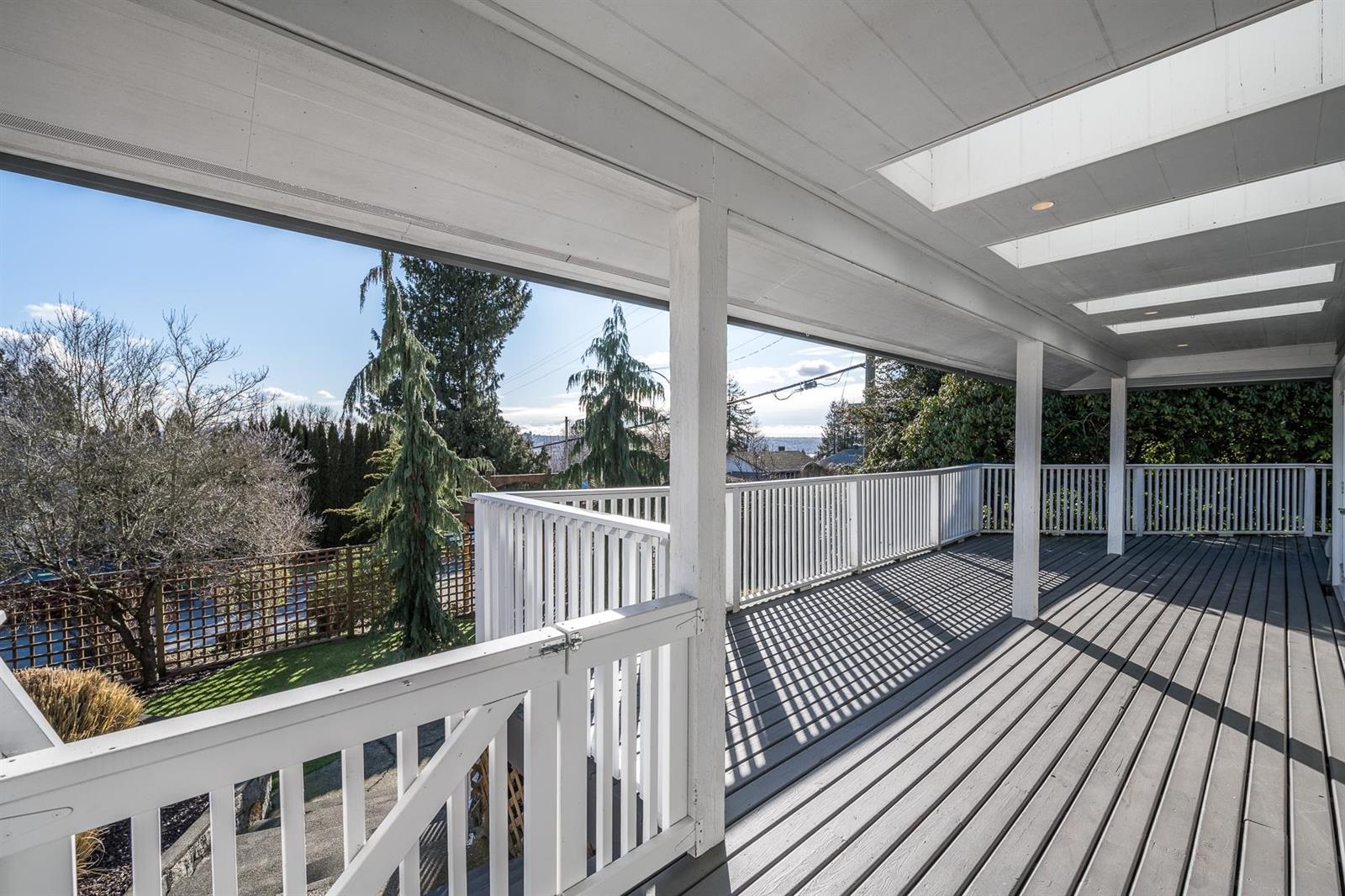 The covered deck at the back of the house.