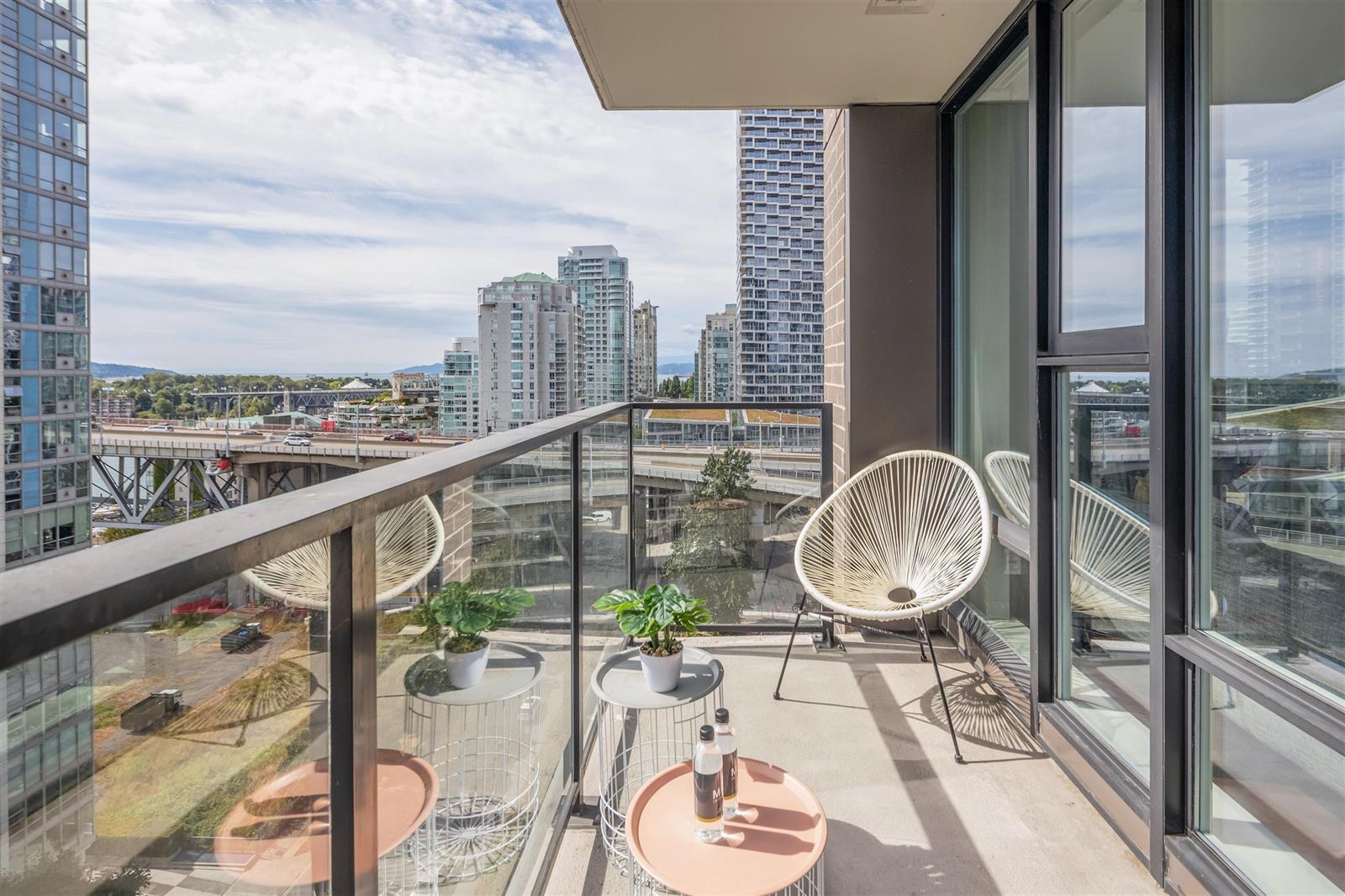 The balcony seating, the park and the streets below the rail.