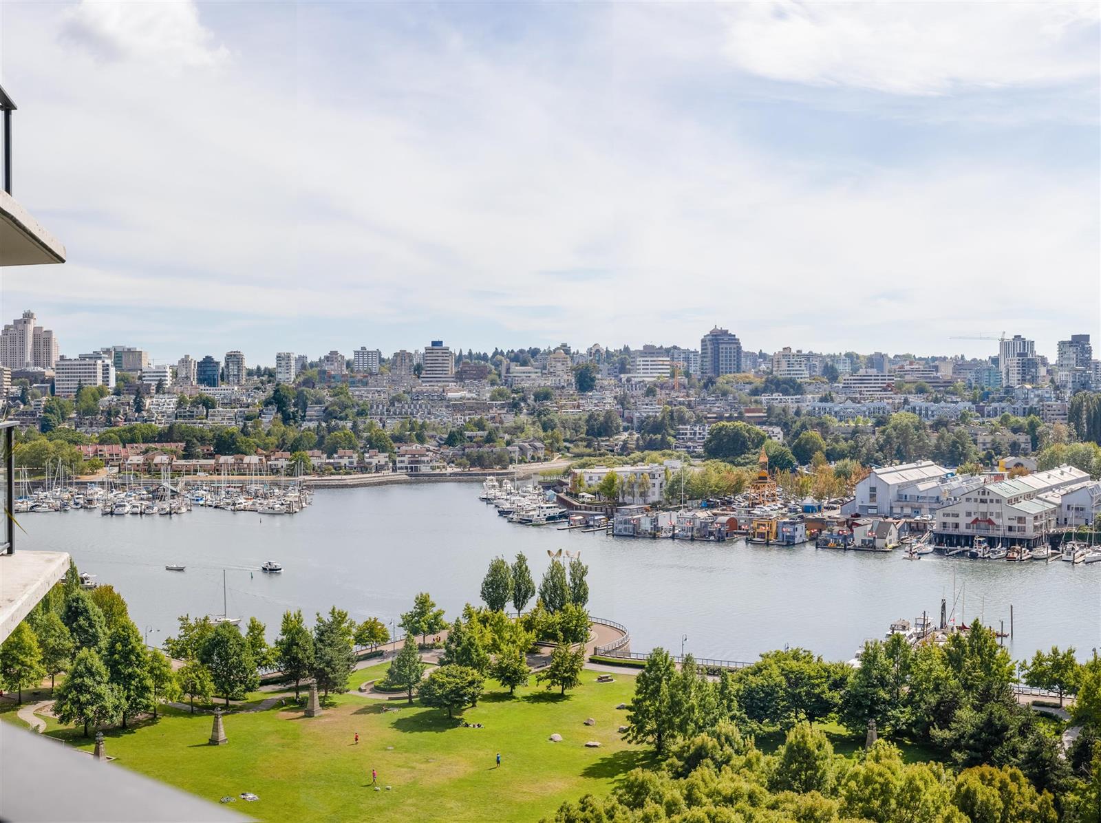 The park and False Creek from above, the seawall curving around the water.