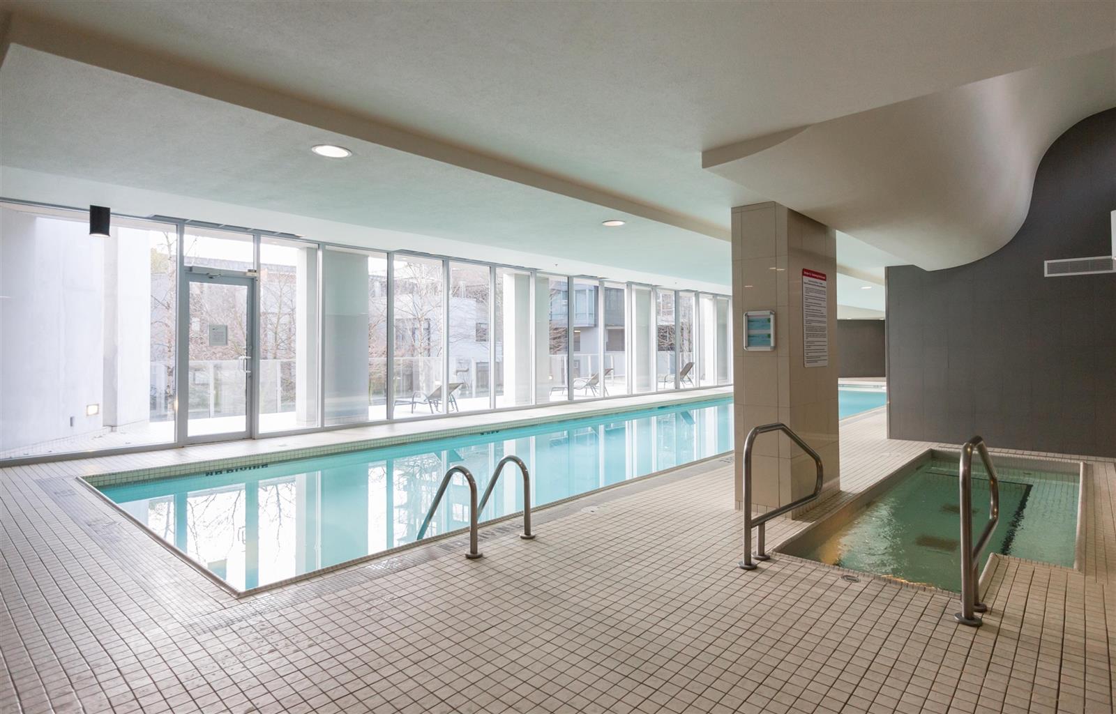 The indoor pool, a lane running the length of a room lined with windows.