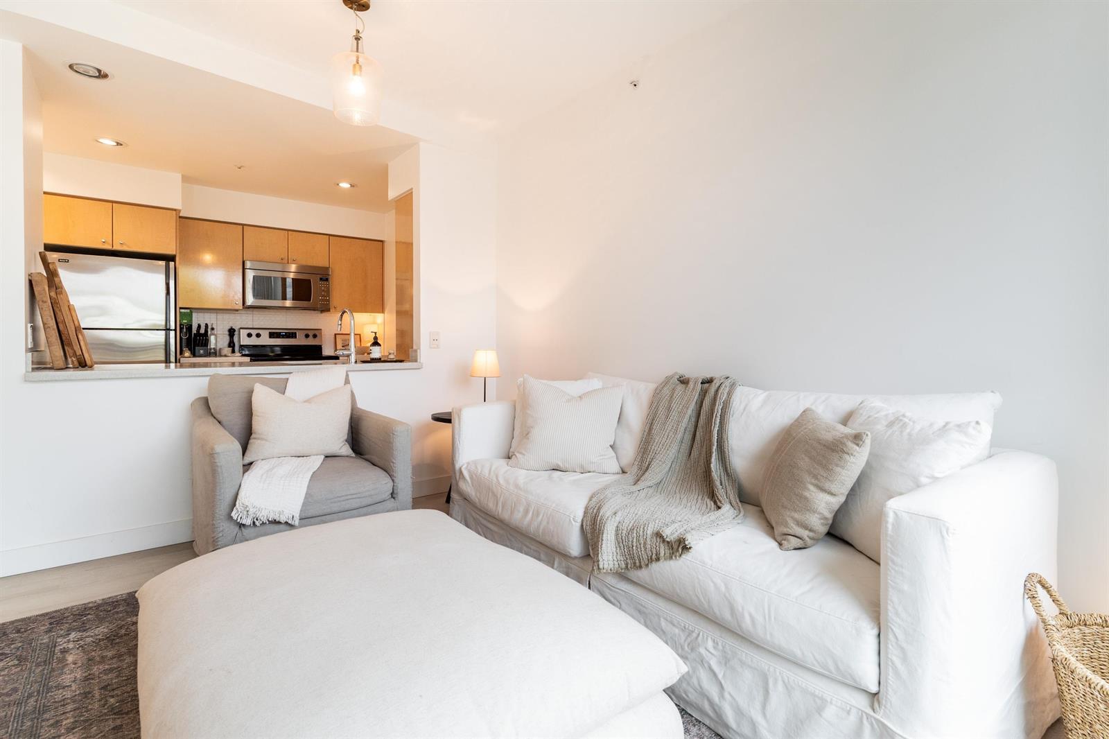 The sectional and its cushions, with the kitchen counter behind.
