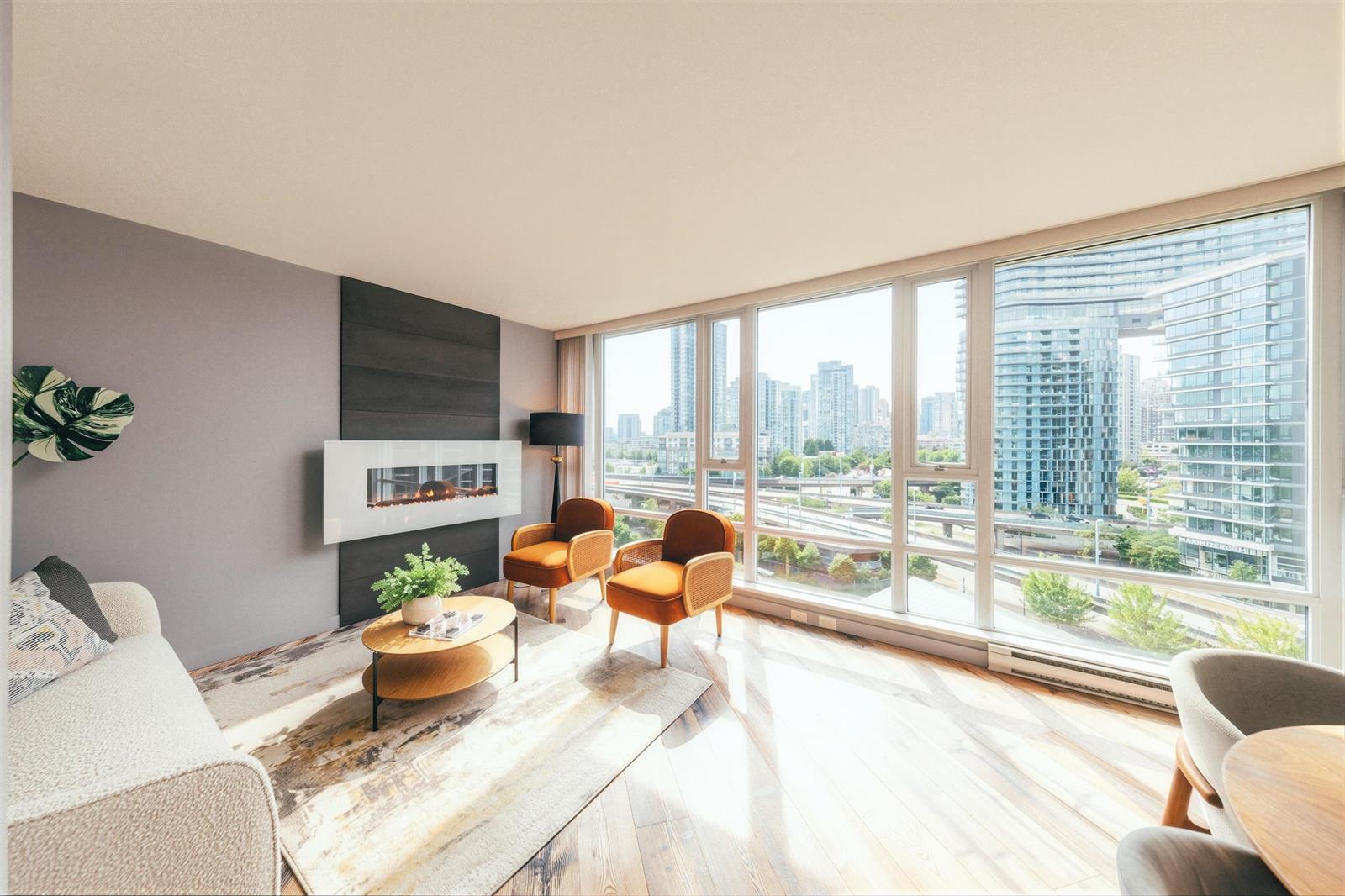 The living room from the hall, floor-to-ceiling glass down the long wall and the dining table at the far end.