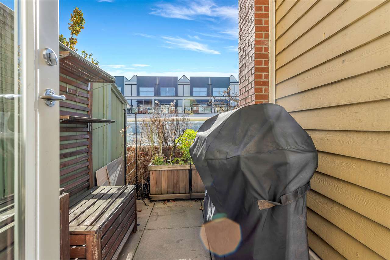 The deck off the living room, looking out over the neighbourhood.