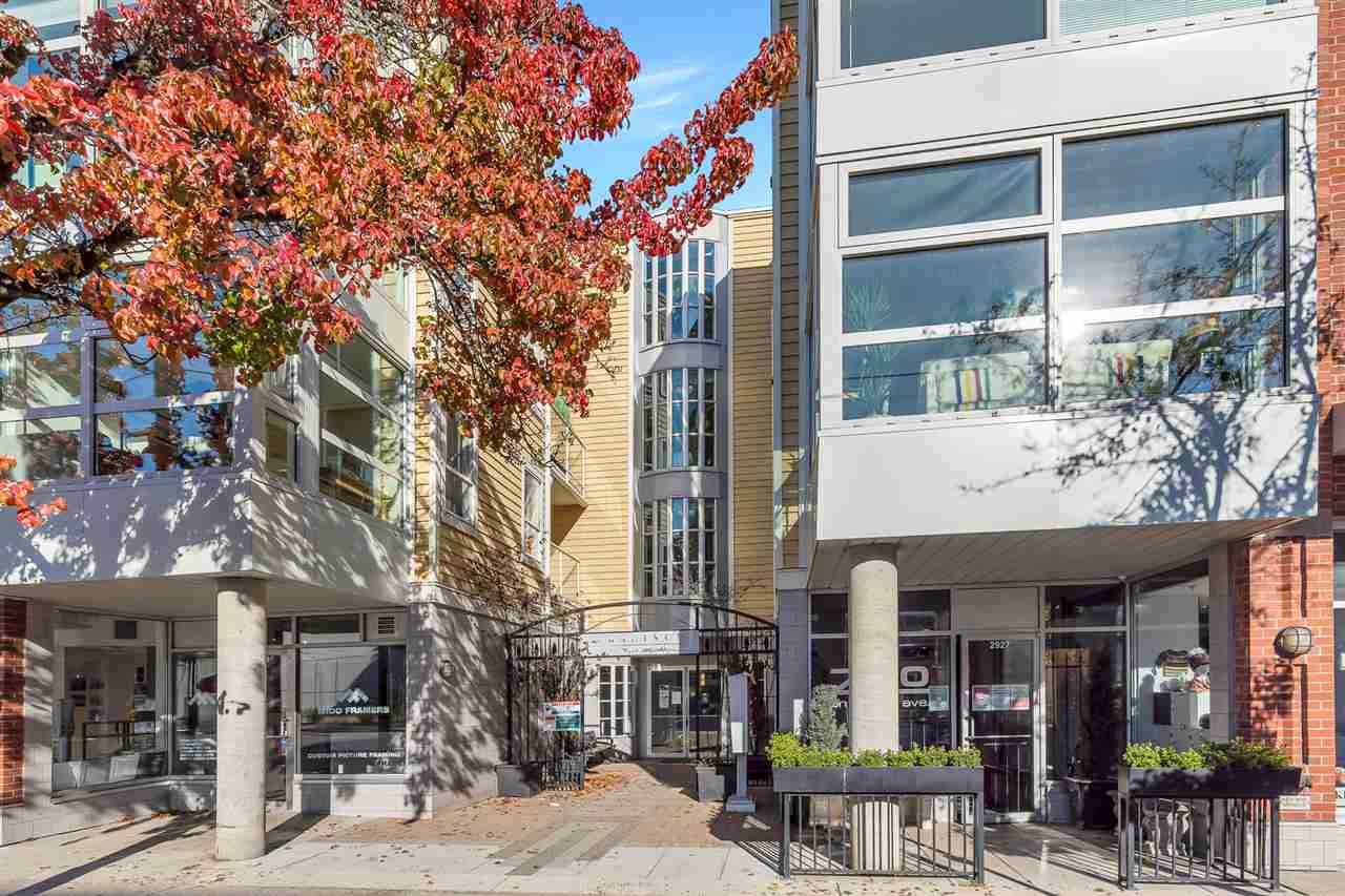 The Madison from West 4th Avenue, shops along the ground floor.