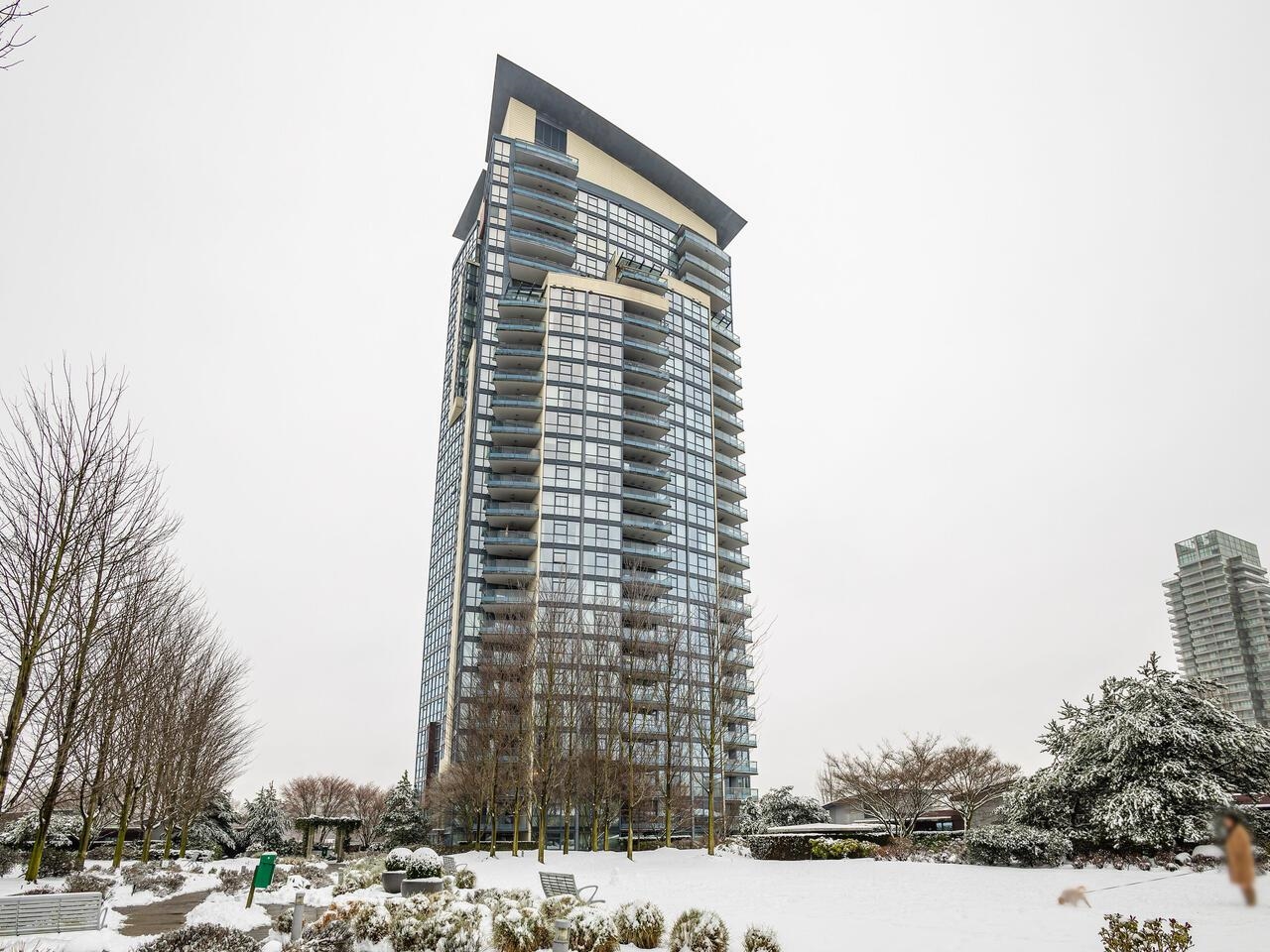 The tower from the garden, its balconies curving up the face of the building.