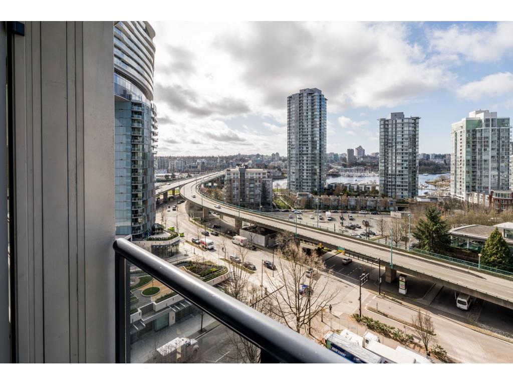 The view from the balcony, the boulevard below and the towers running north.