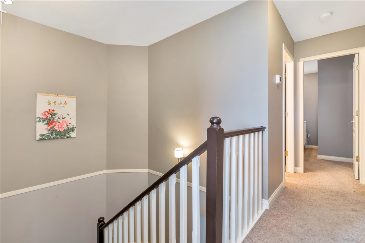 The upper landing at the top of the stairs.