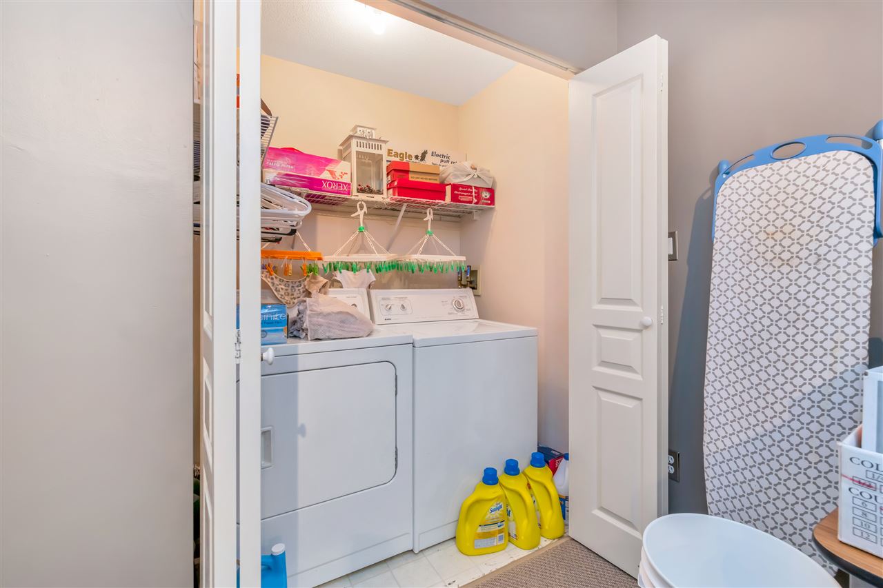 The laundry room, washer and dryer side by side.
