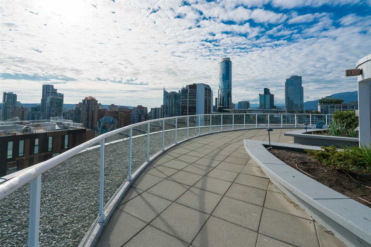 The rooftop terrace itself, its curved rail running around the top of the building.