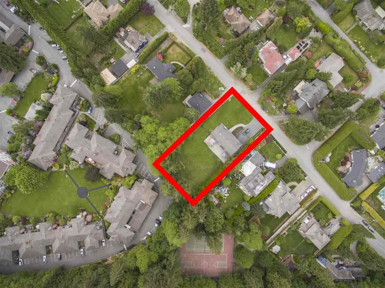 An aerial view of the block with the property outlined in red.