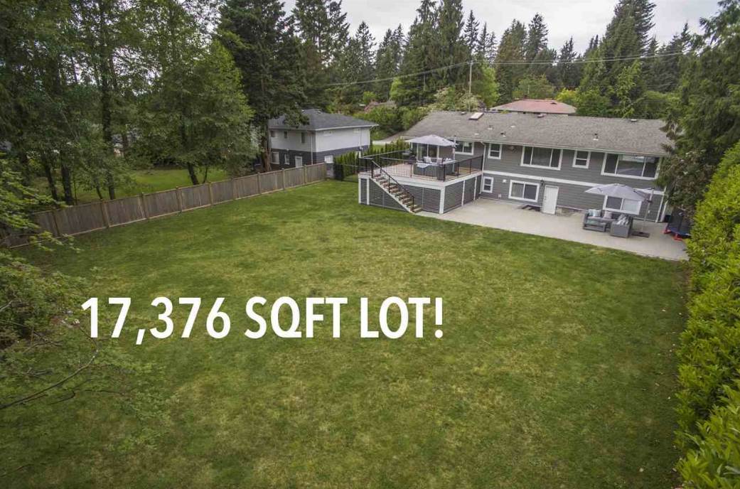 An aerial view from behind the house showing the depth of the rear lawn.