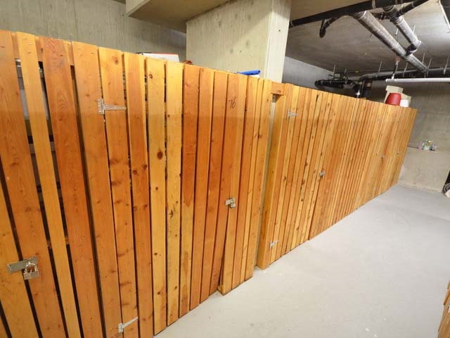 The second locker, the same cedar slatting seen from the other side.